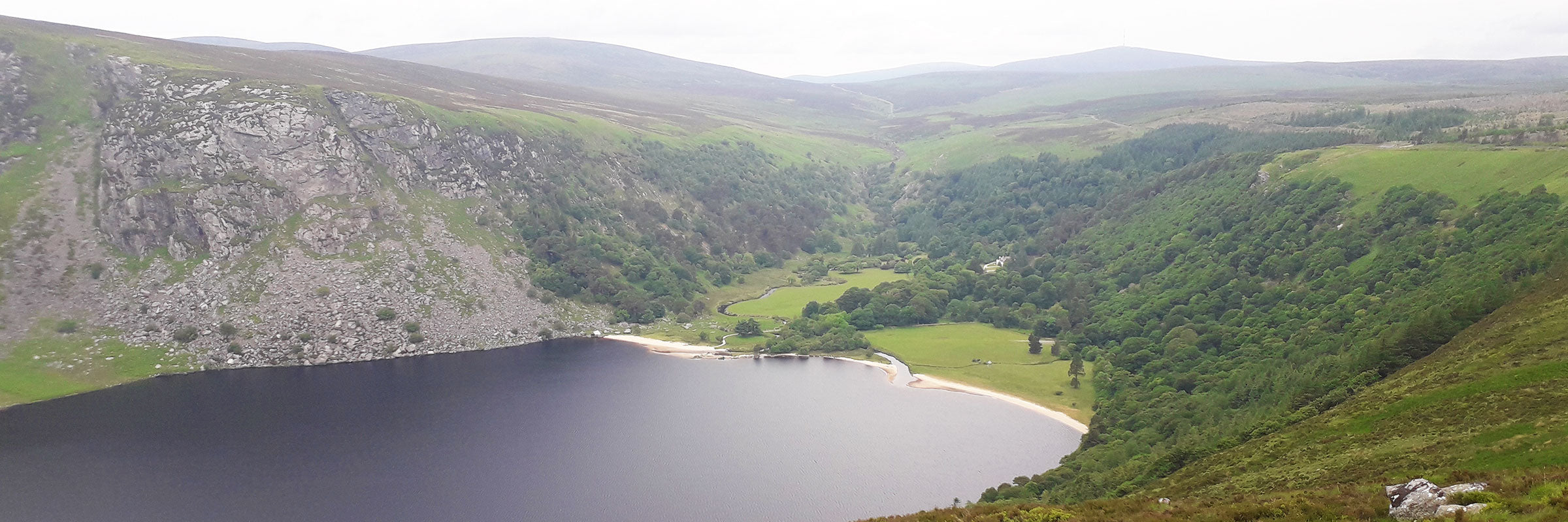 Teddy Ireland presents: Panoramic view of iconic Lough Tay, Co. Wicklow Ireland 